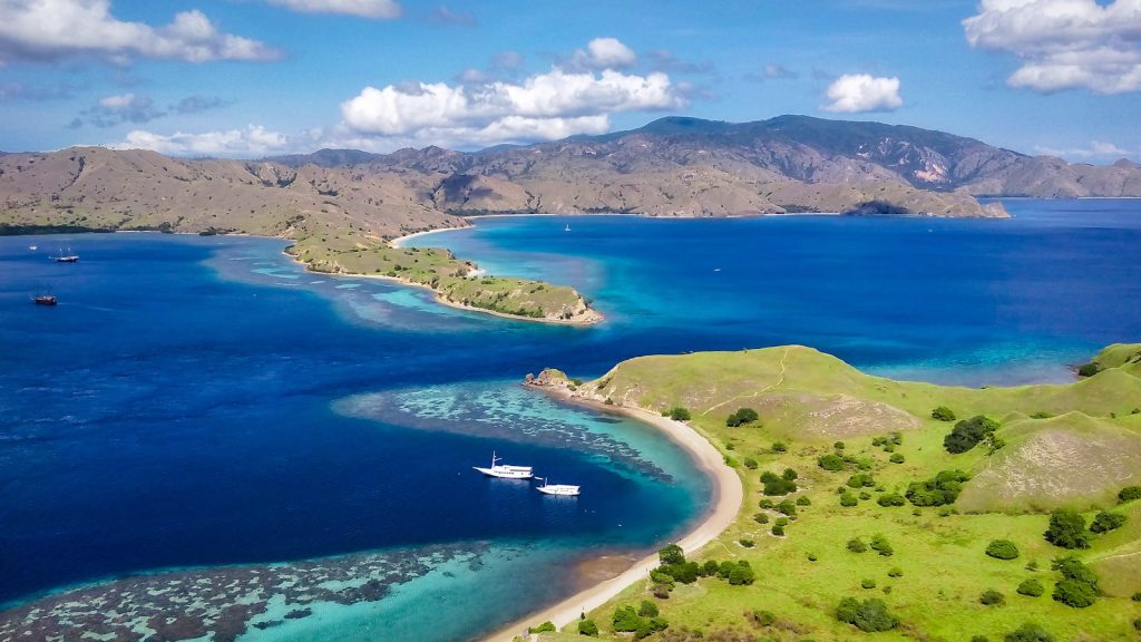 Beautiful tropical island scene with clear blue water.